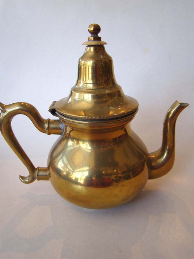 A beautiful brass pear shaped teapot, probably Dutch, circa 1820